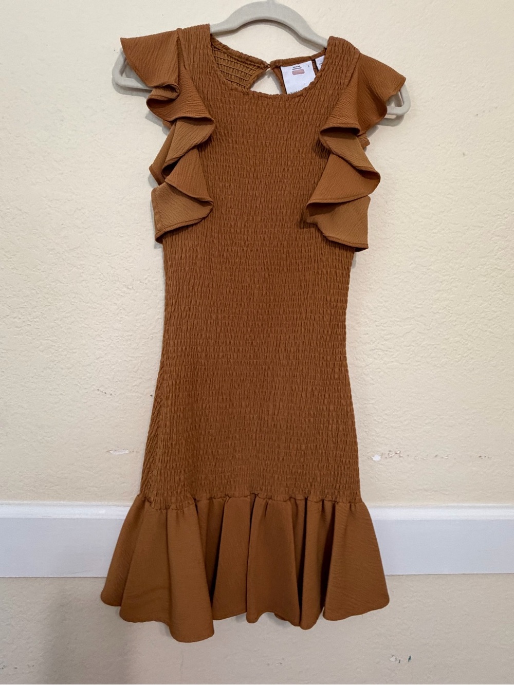 Ruffle Sleeve Dreas with smocked bodice throughout. Dress